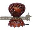 balishine This lamp is produced in Bali made from coconut wood.