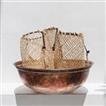 balishine This basket is produced in Kalimantan Borneo and made from natural rattan. You can use it as a basket in your table but also as backpack with his strips.